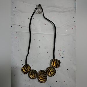 Elegant Gold and Black Necklace
